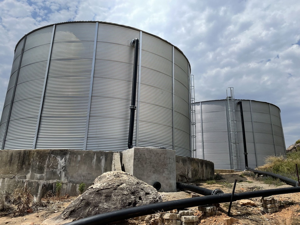 An Aquadam steel water tank on a hill supplying irrigation water to a citrus farm
